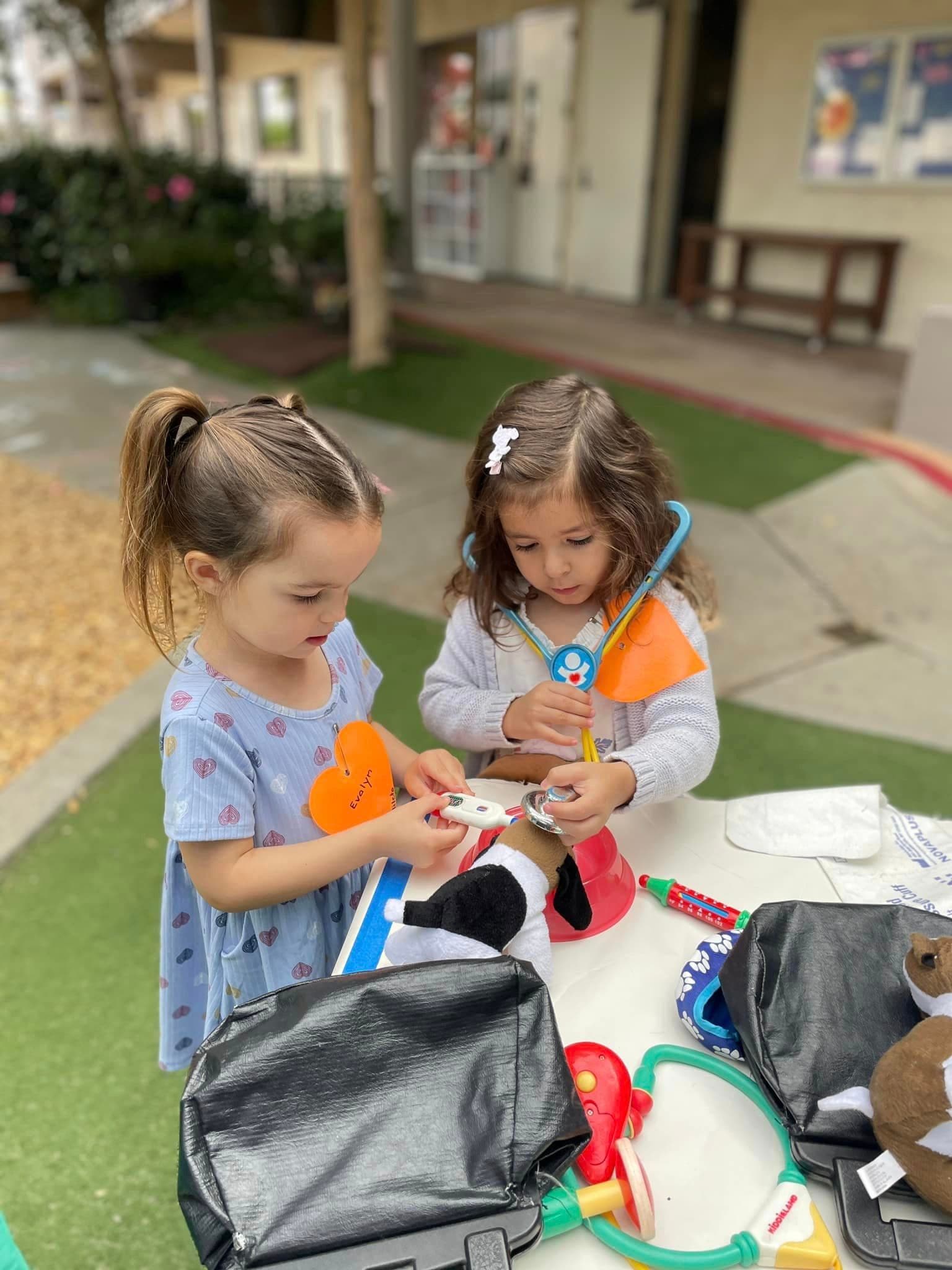 Two children playing outside together